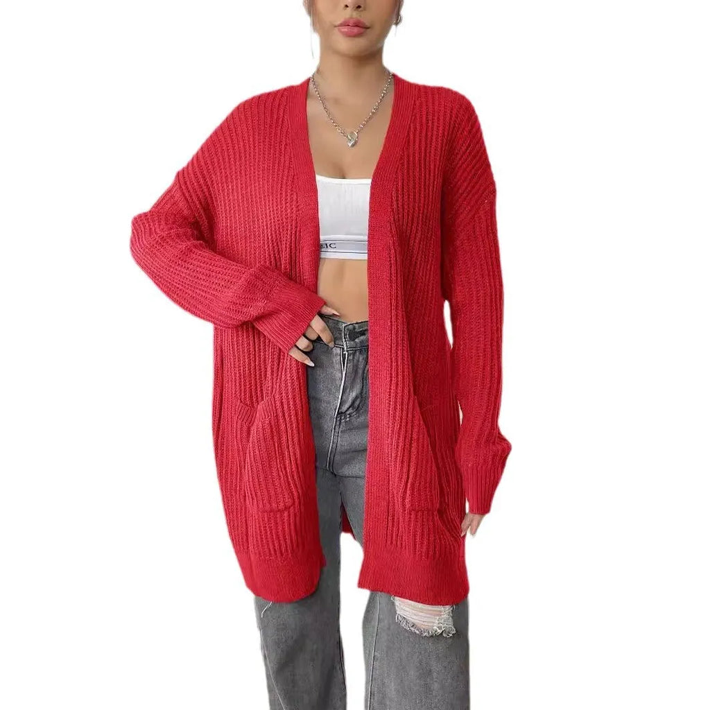 Women's loose fit acrylic cardigan sweater with double pockets in dark green colour