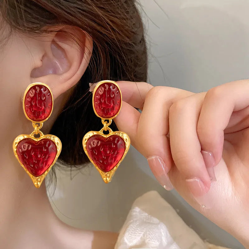 Silver pleated oval love heart stud earrings in alloy, showing green, purple, red, and yellow white colour options.