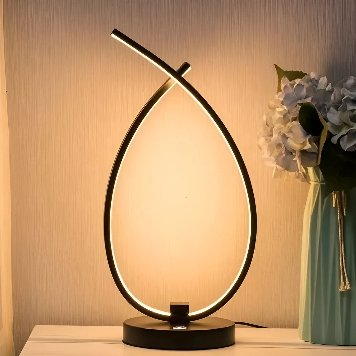 Black and white USB touch control table lamp with water drop shape measuring 30cm tall