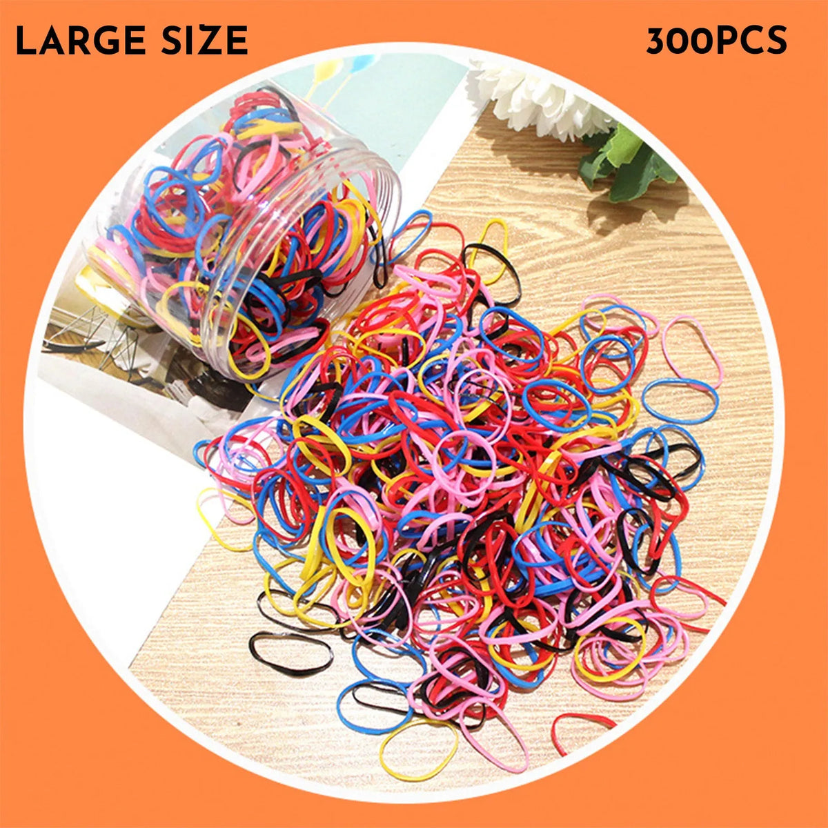 Assortment of colourful small TPU baby hair ties in a reusable plastic container.