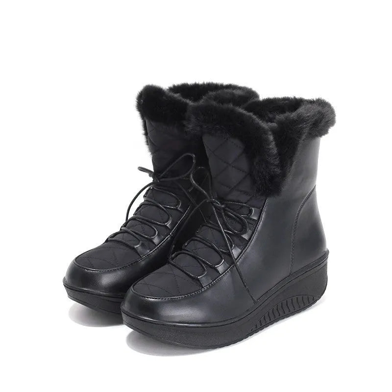 Women's black platform winter boots with lace-up closure and plush lining