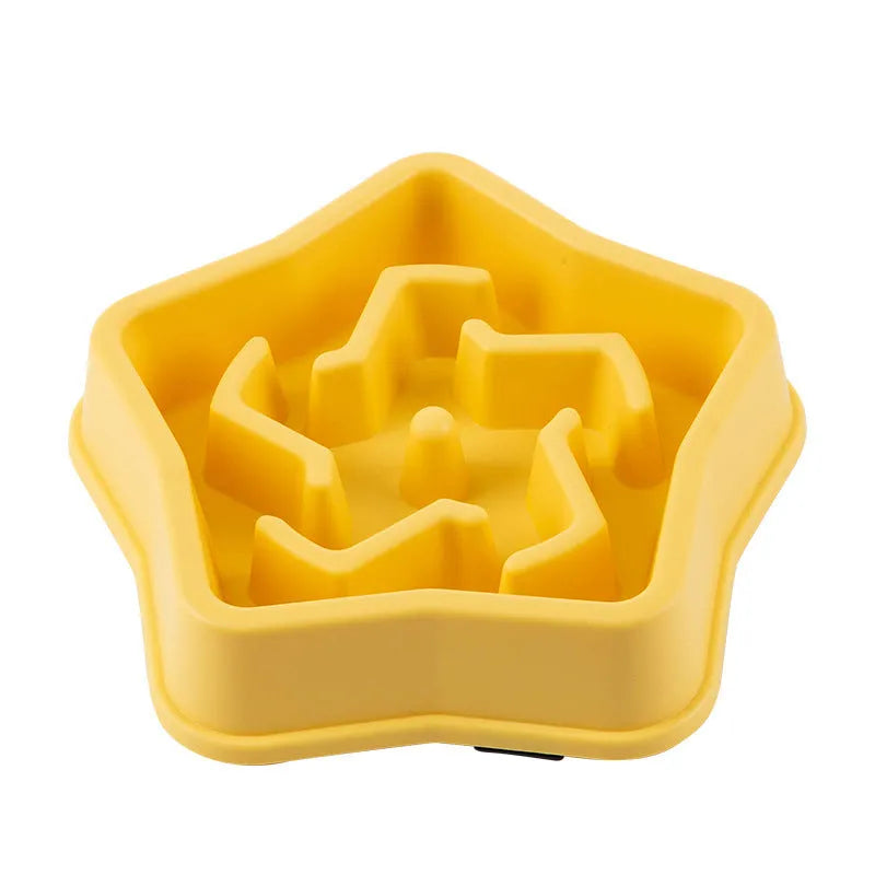 Yellow plastic slow feed dog bowl with raised internal ridges measuring 20.1 cm across