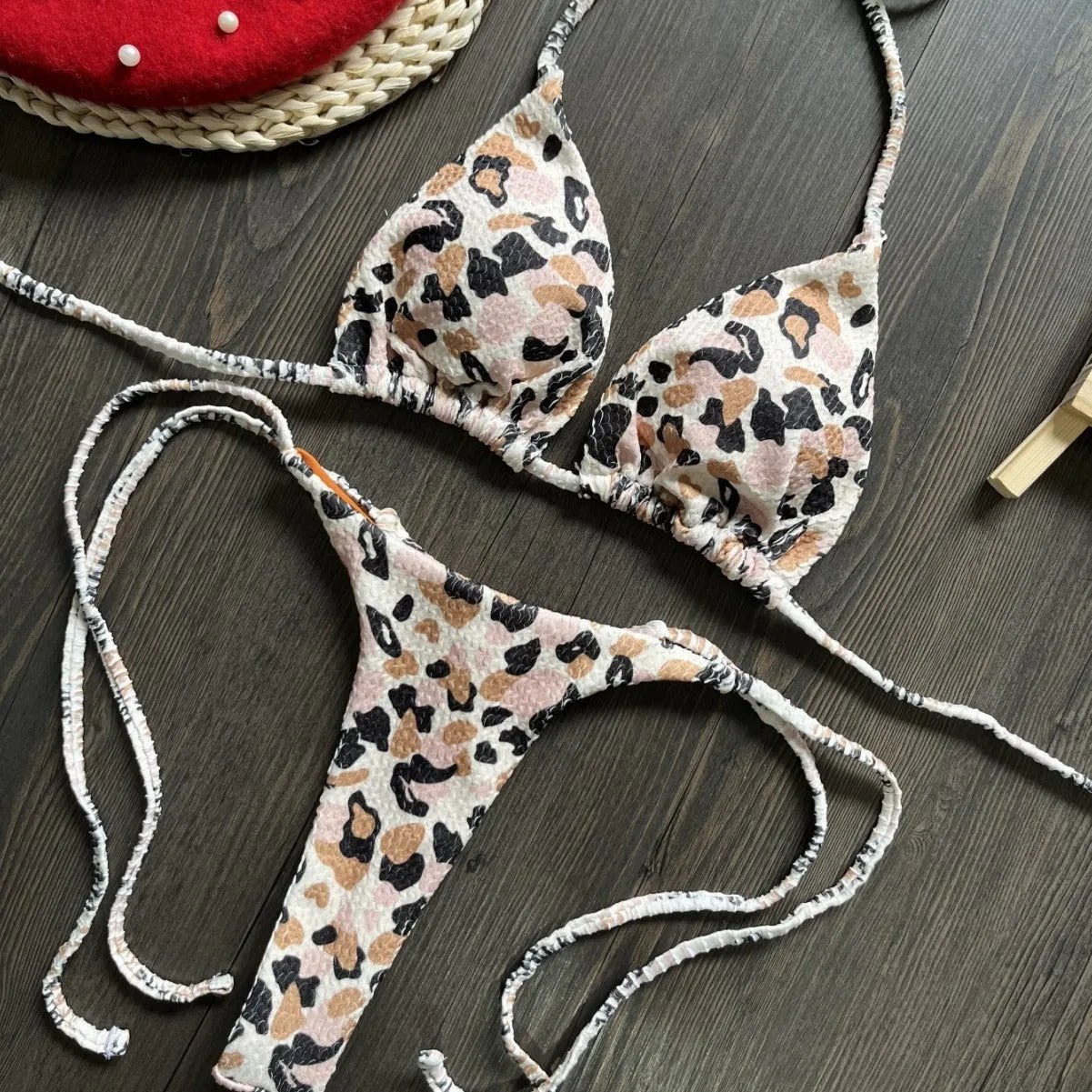 Women's printed bikini swimsuit with quick-drying fabric shown in one of three available colour options