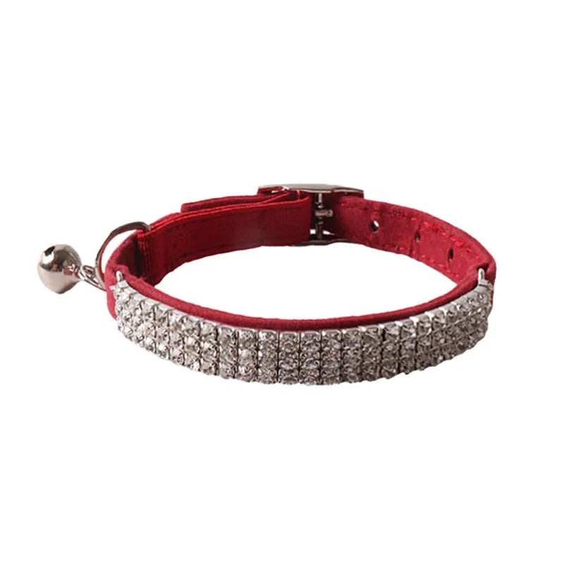 Flocking cat collar with elastic buckle in assorted colours on a white background.