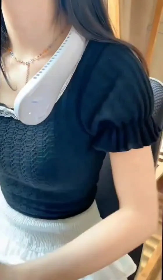 Pink bladeless neck fan with USB charging port and flexible neckband