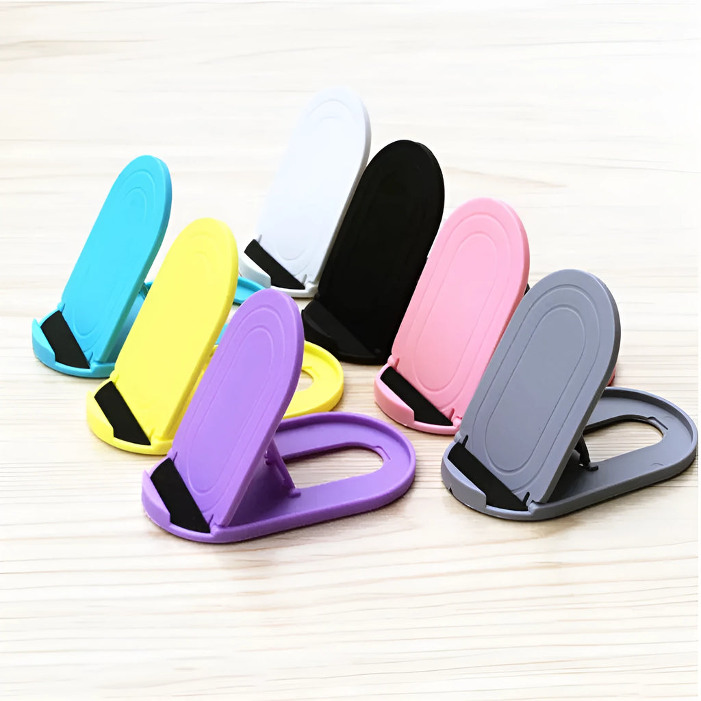 Plastic mobile phone stand with lazy bracket, holding a smartphone, shown in multiple colour options.