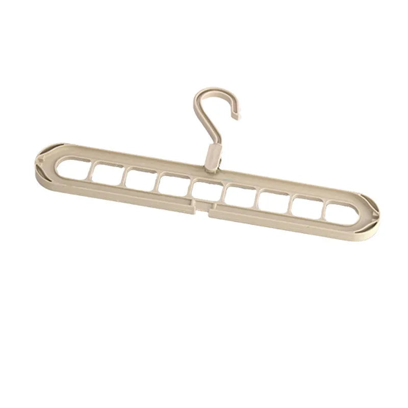 Plastic nine-hole clothes hanger with folding pant rack in a choice of five colours.