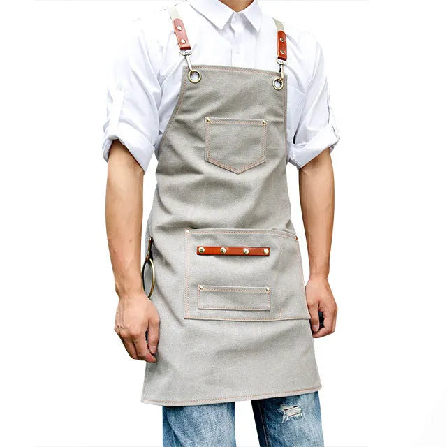 Canvas apron with cross-strap back design in camel colour for work protection