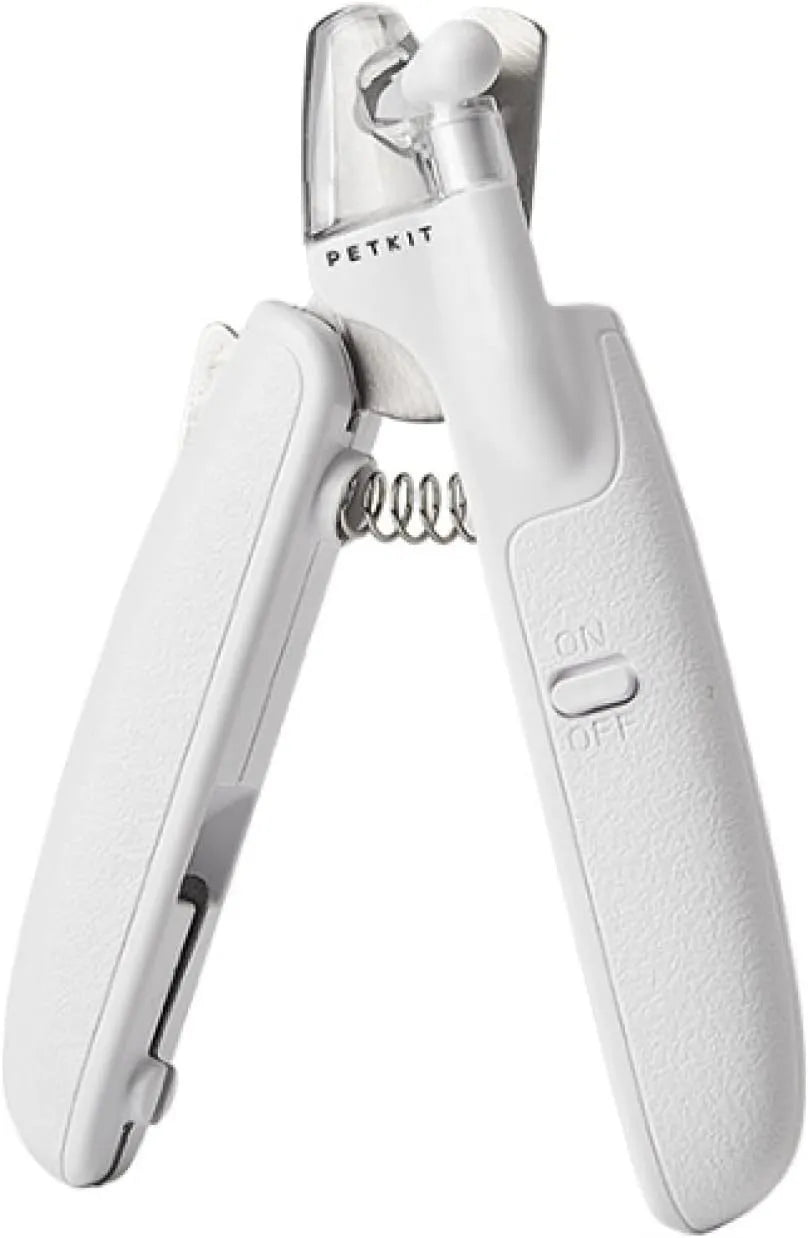 White LED pet nail clippers with transparent guard open, showing triangular steel blades and a nail file.
