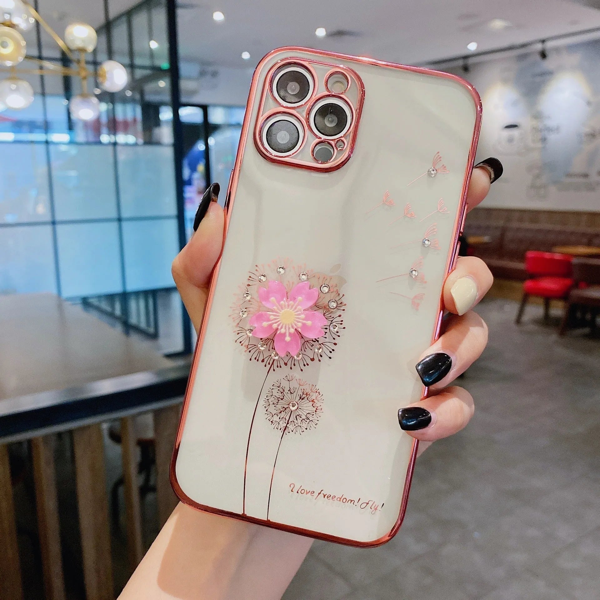Green iPhone case with a 3D floral spin stand on the back and a built-in screen protector.