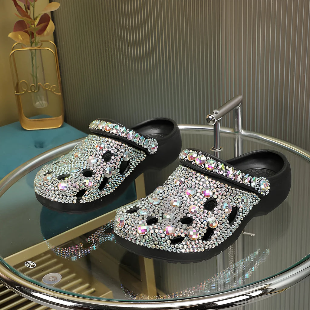 Black women's platform sandals with rhinestone detail on EVA upper.