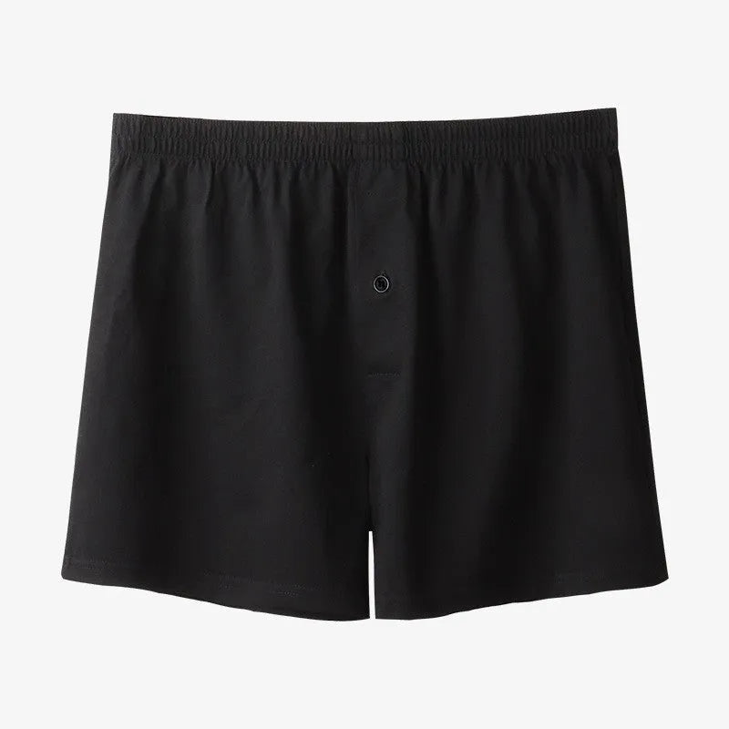 Men's cotton boxer shorts in light grey, dark blue and black colours showing high waist loose fit design