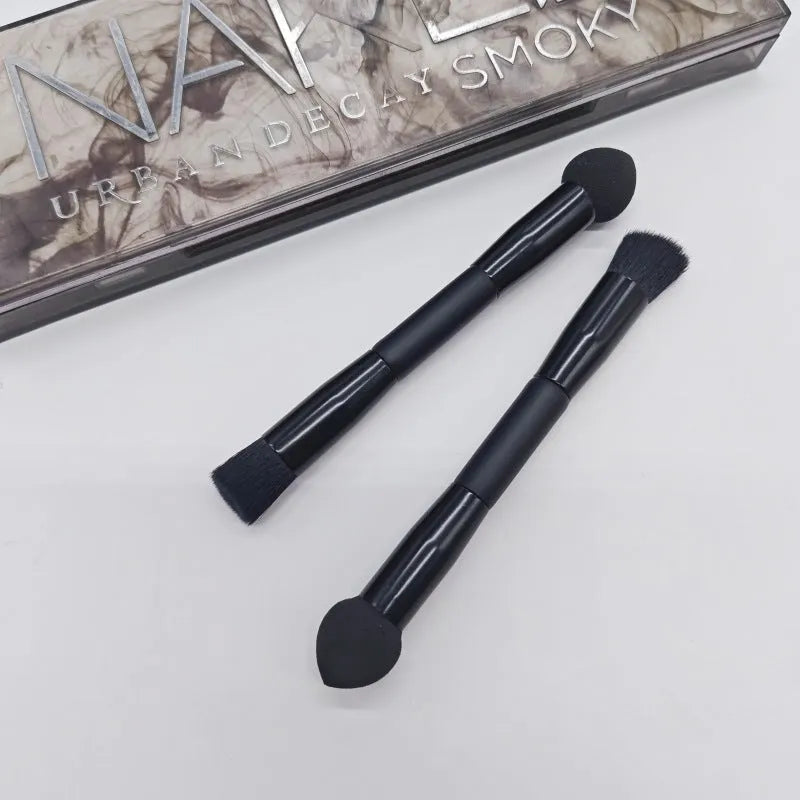 Double-headed concealer brush with black wooden handle and a miter sponge
