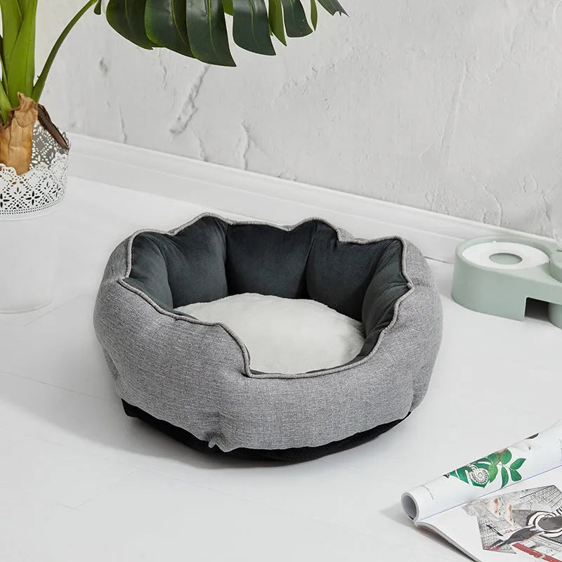 Blue octagonal pet bed with soft wool point design and removable mat for a small dog.