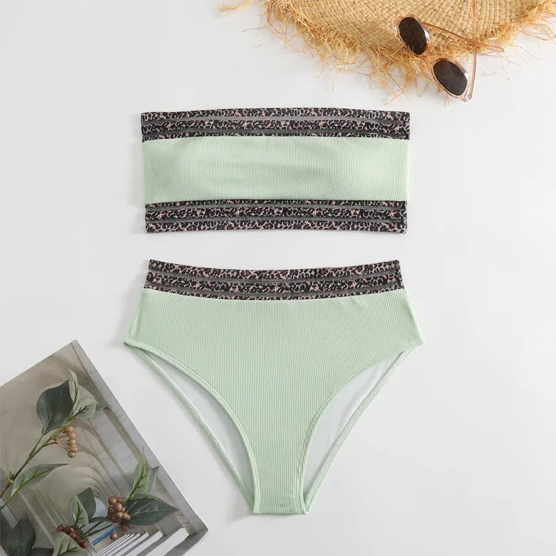 Black strapless split swimsuit with leopard print splicing pattern on mannequin