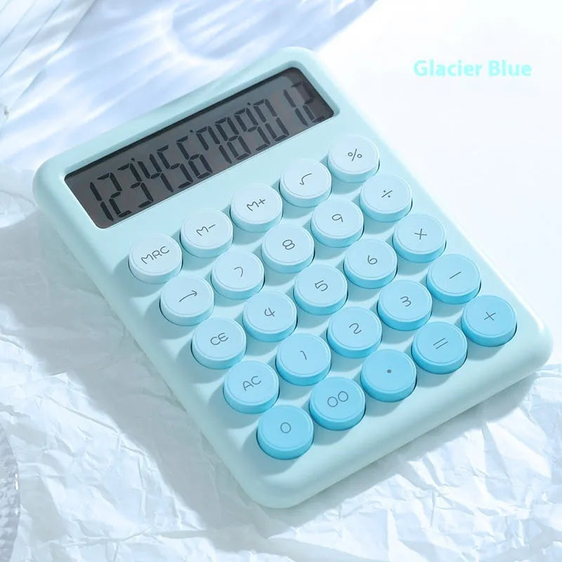 Dopamine gradient colour desk calculator in violet, pink, blue, or mint green on a desk.
