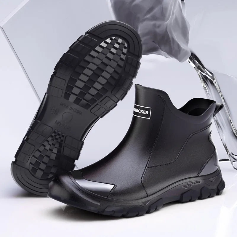 Short tube PVC wading shoe with round toe and non-slip plastic sole on a wet surface.