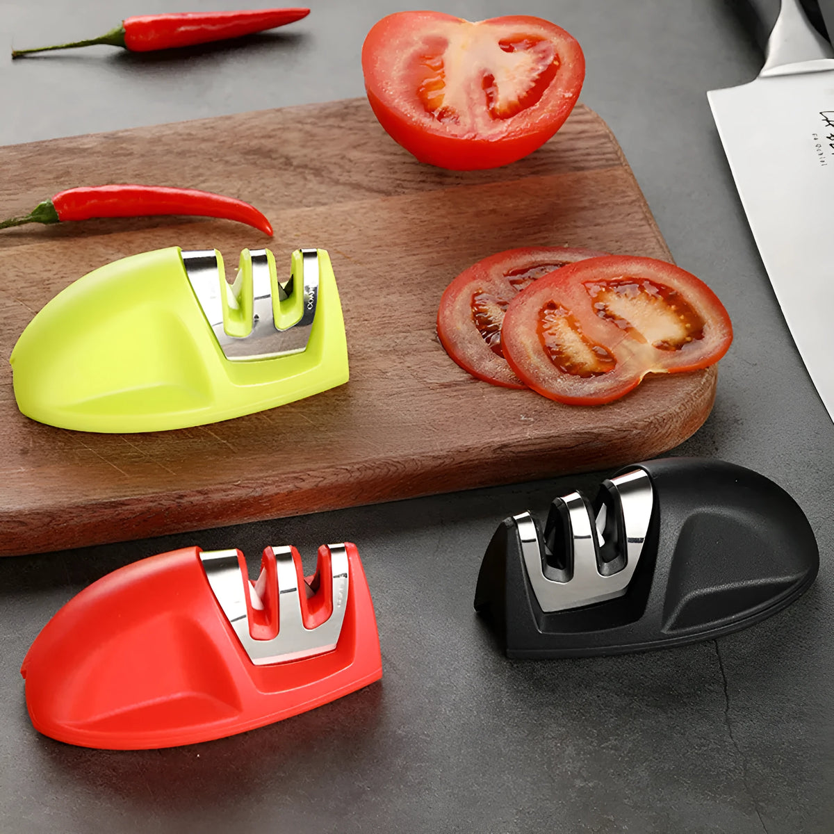 Mini two-stage knife sharpener in PP and 201 stainless steel, mouse-shaped, shown in one of ten colour options.