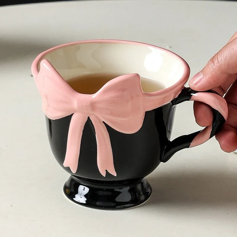 Ceramic mug with heart bow design in black pink or white powder, 301-400ml capacity