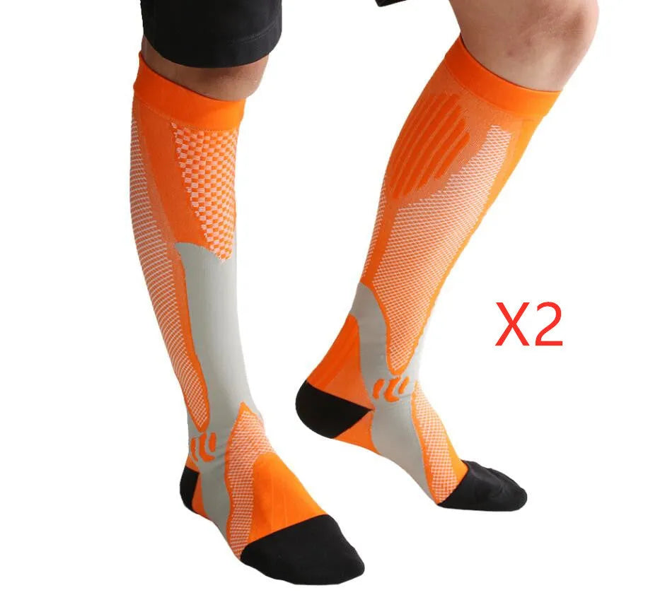 Graduated compression socks for men and women in black, blue, orange, pink, and white colour options