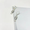 Retro fishbone-themed alloy necklace with adjustable O-chain and matching earrings.