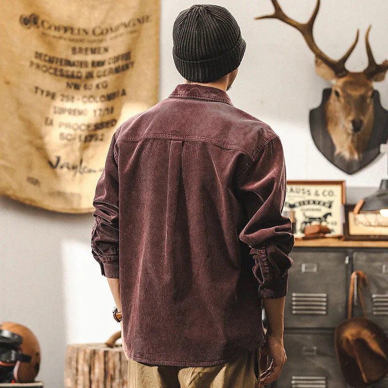 Men's red loose-fit corduroy style casual shirt jacket with long sleeves.