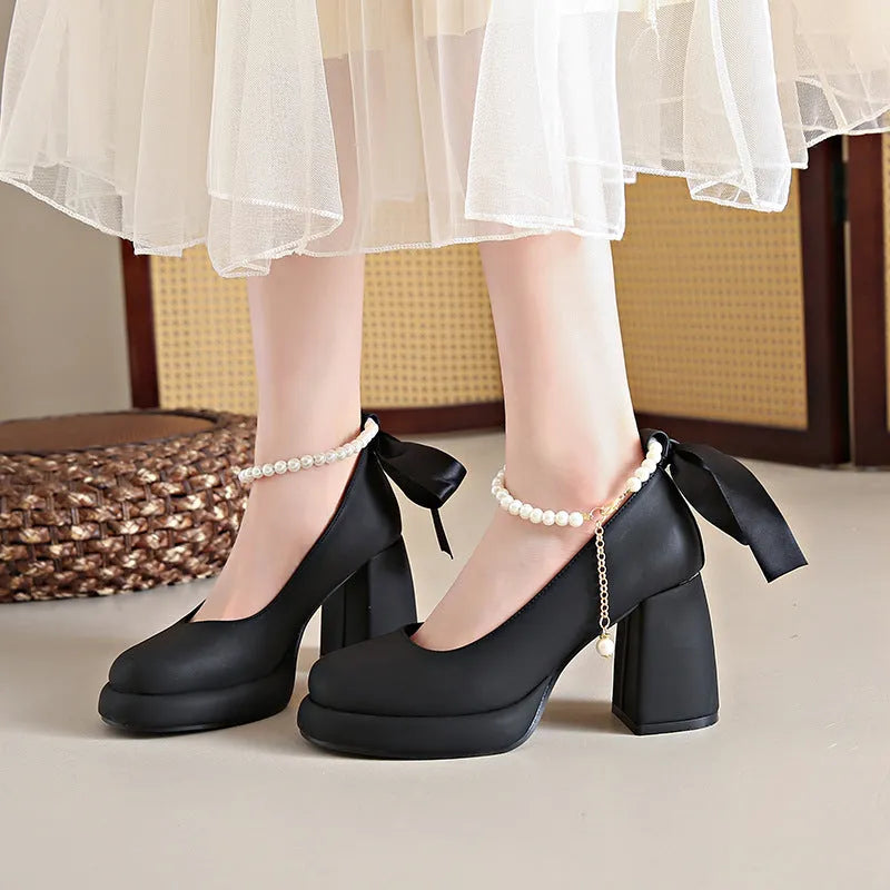 Women's beige Mary Jane shoes with chunky heel, pearl decoration, and ankle-strap buckle