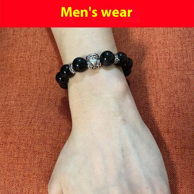 Unisex obsidian bracelet with lucky colour eye beads and silver cloud pattern detail, showing male 12mm and female 10mm sizes.