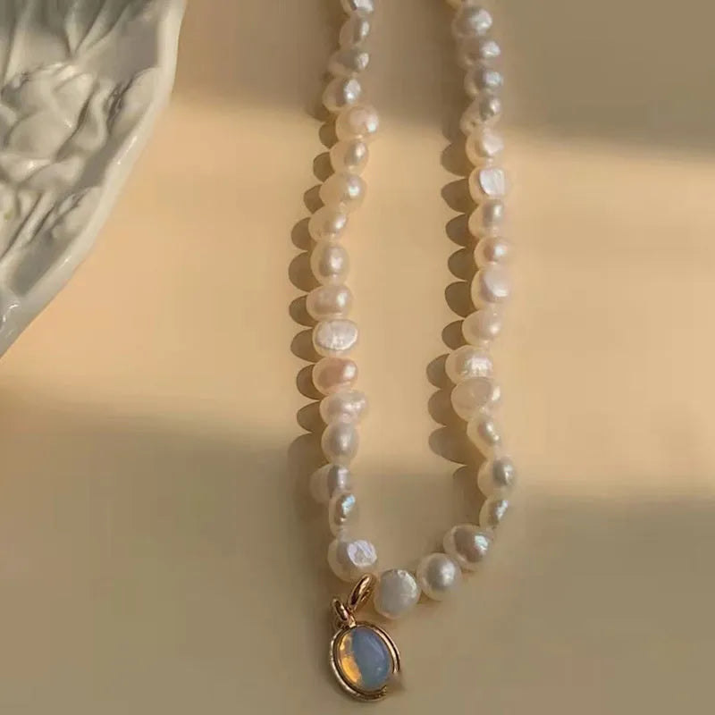 French Court vintage necklace with geometric alloy pendant and pearls on an adjustable 21-50cm chain.