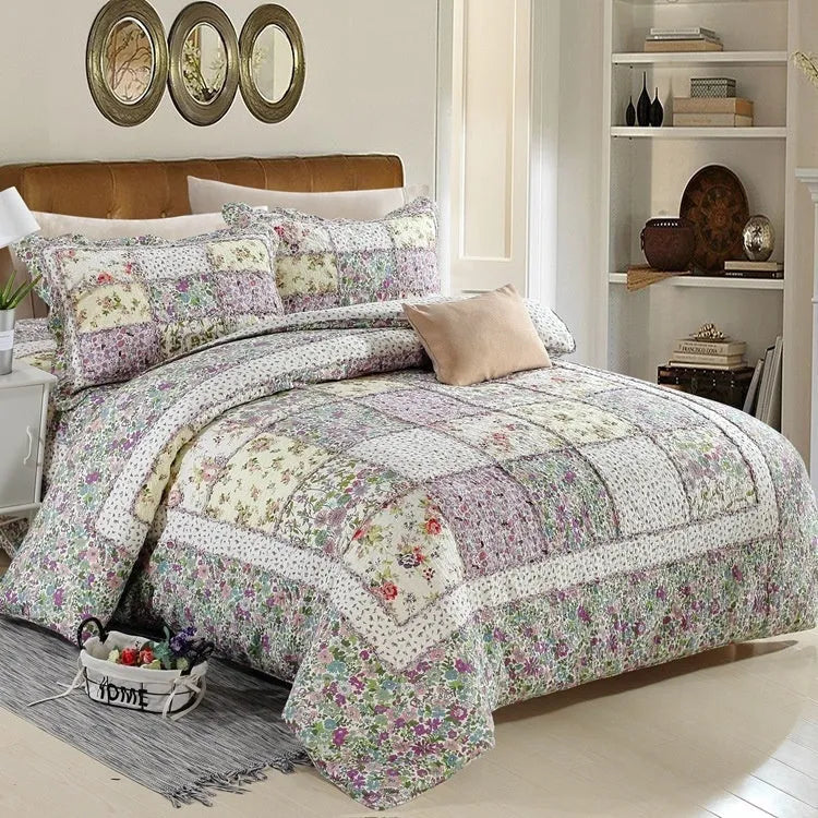 Pure cotton quilted bedspread and pillowcase three-piece set in a chosen colour pattern on a bed.