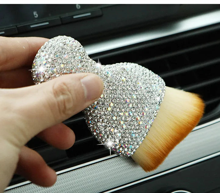 Soft PVC car interior cleaning brush for dust removal on dashboard and seats.