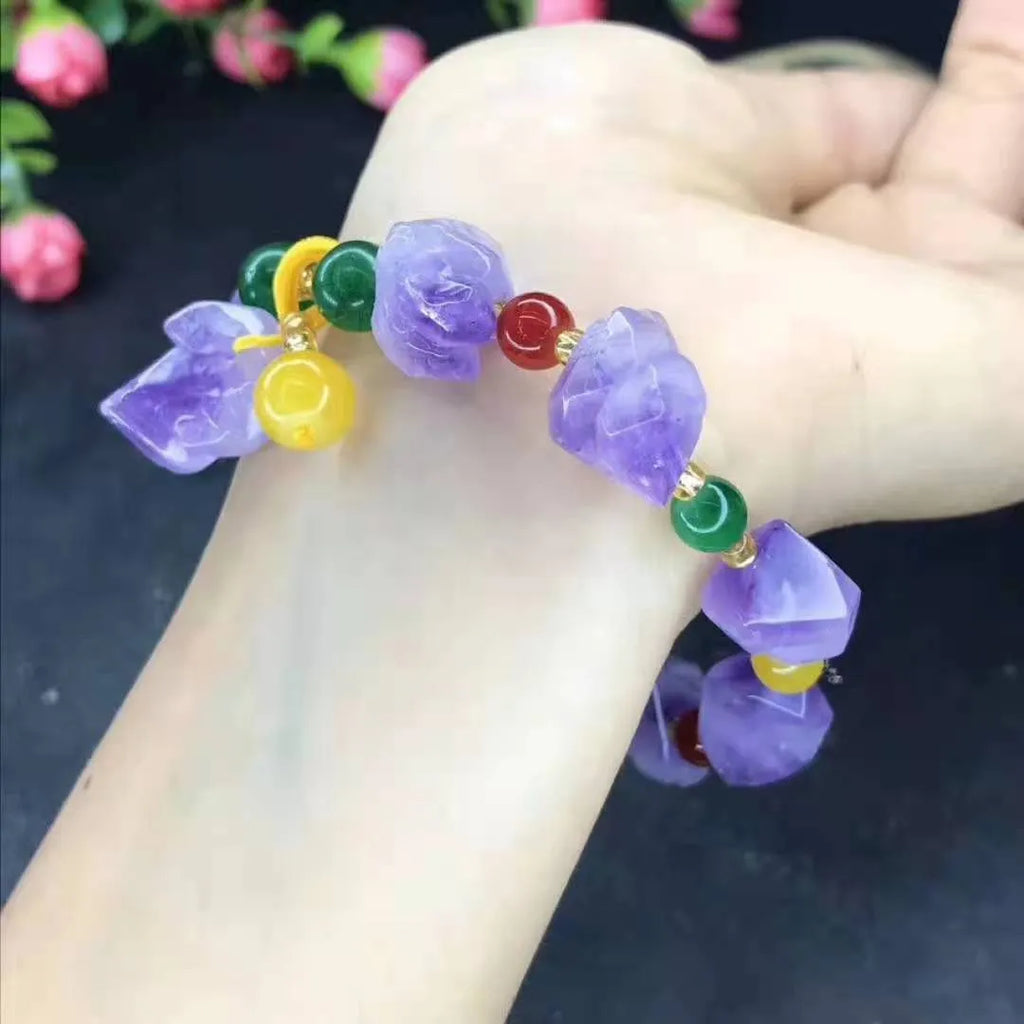 Natural shaped purple amethyst bead bracelet for women with a fu character charm.