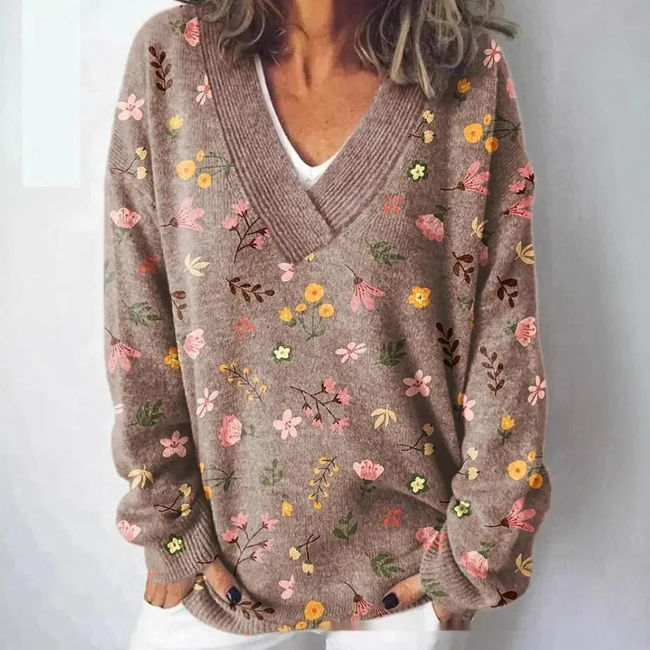 Women's V-neck long sleeve sweatshirt with a white-based 3D floral print pattern.