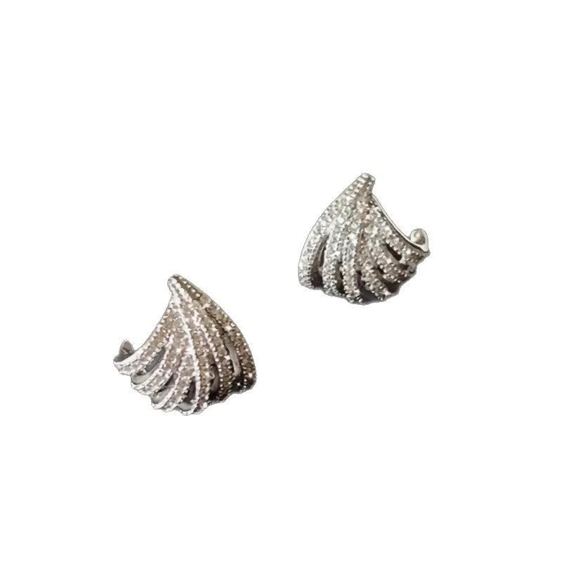 Pair of geometric line design earrings with platinum electroplated finish on zircon.