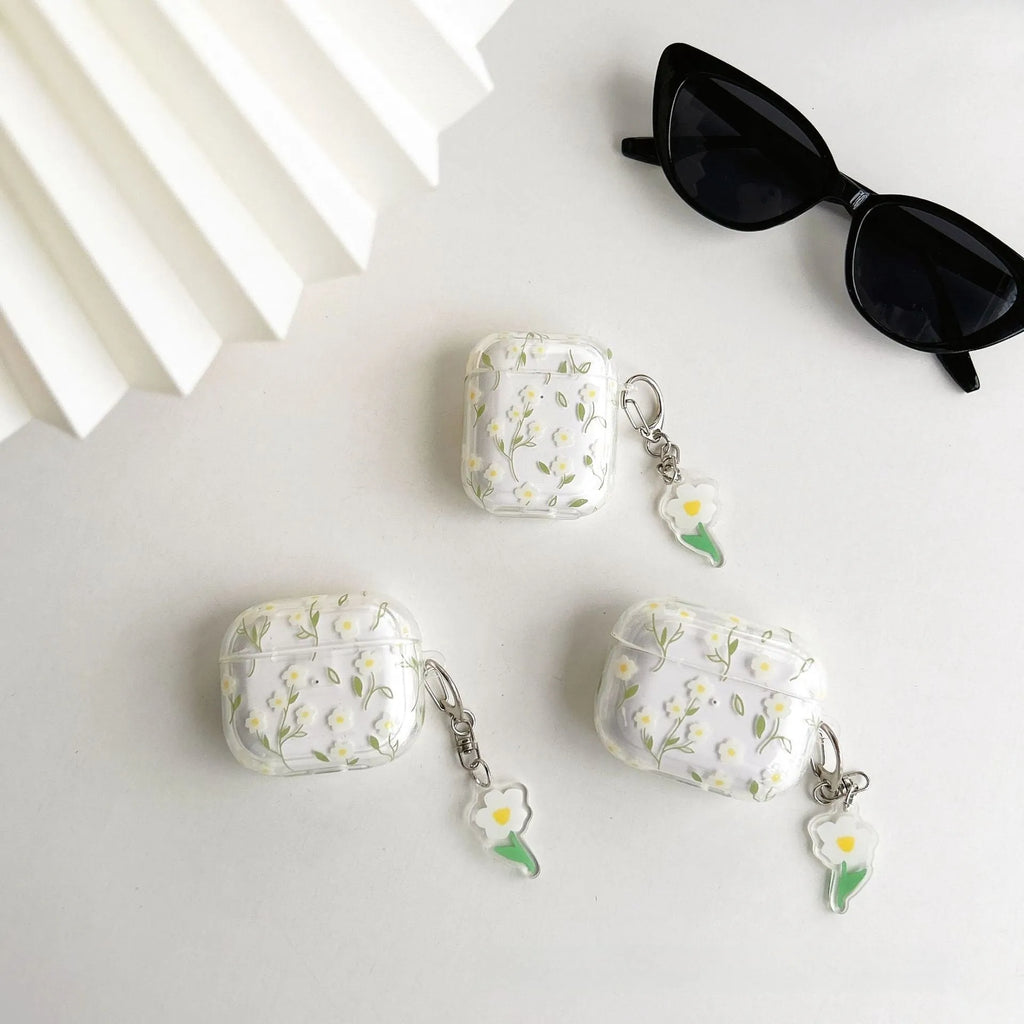 White floral design on a clear TPU protective cover for Apple AirPods case