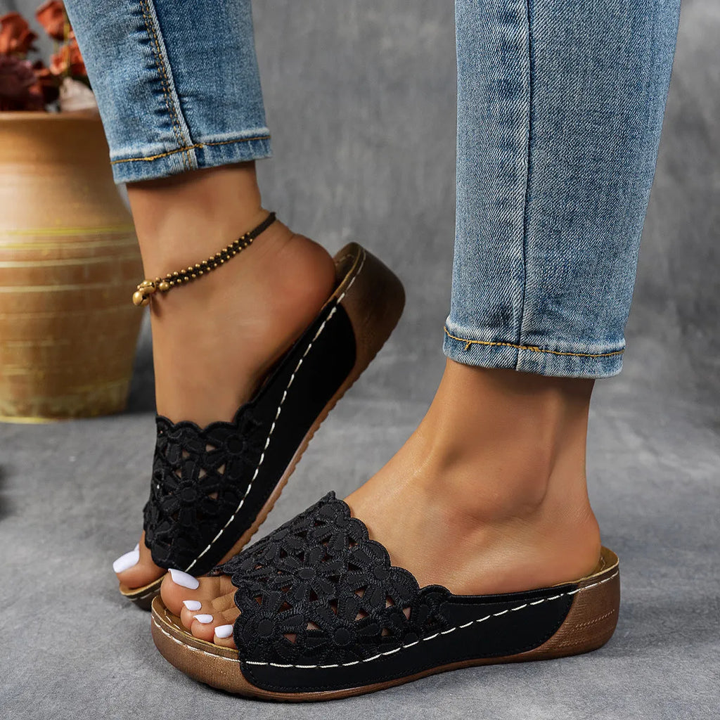 Women's wedge beach slippers with flower cutout detail and fish mouth toe shape in light brown