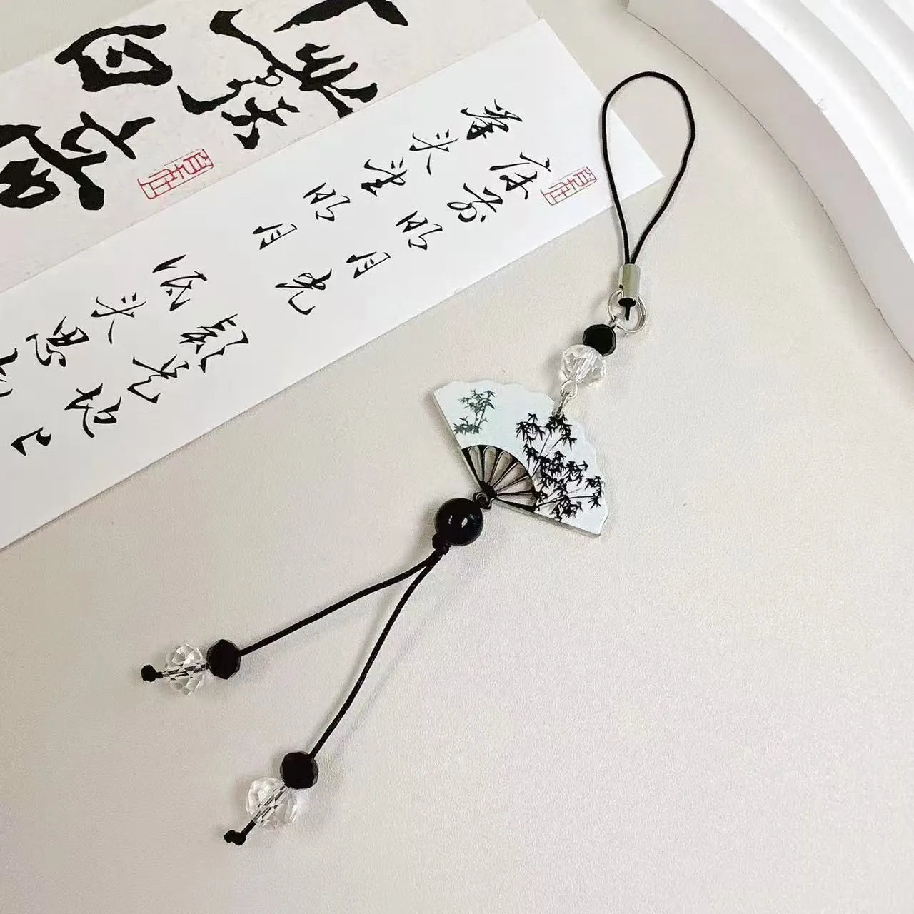 Guofeng style beaded keychain with floral pattern in Fan colour design.
