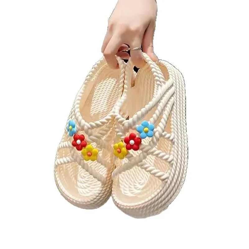 Beige PVC women's sandals with a sunflower decoration and round toe