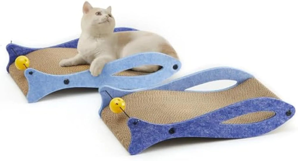 Blue fish-shaped cardboard cat scratcher with a bell toy on a string, shown on a flat surface.