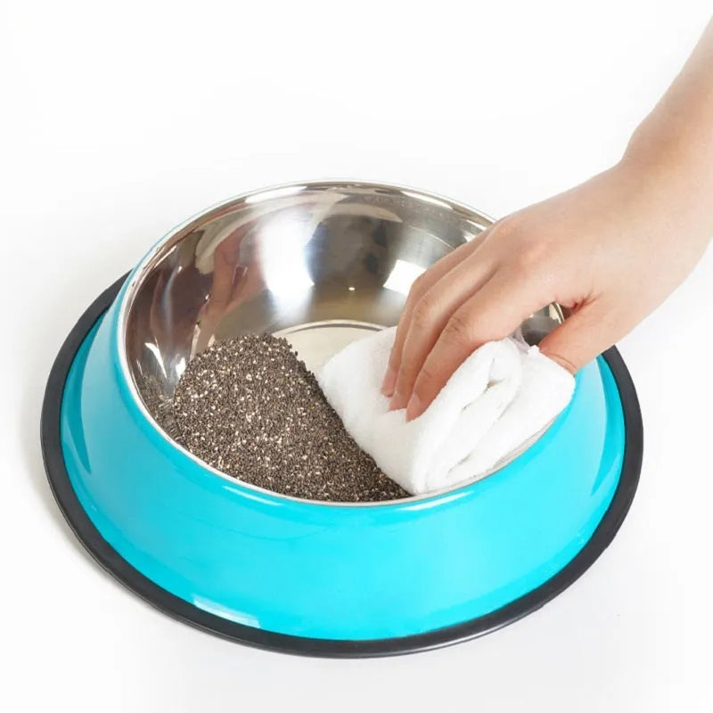 Stainless steel pet bowl inside a colourful melamine bowl, showing non-slip rubber base, in orange colour.