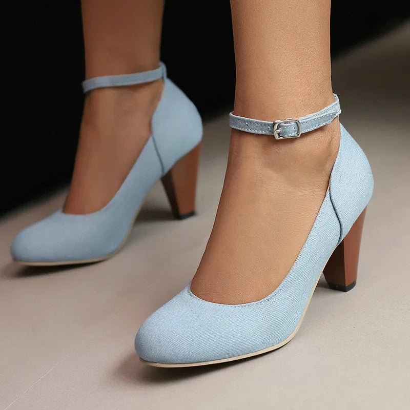 Blue denim women's platform heel shoes with a buckle strap and waterproof sole.