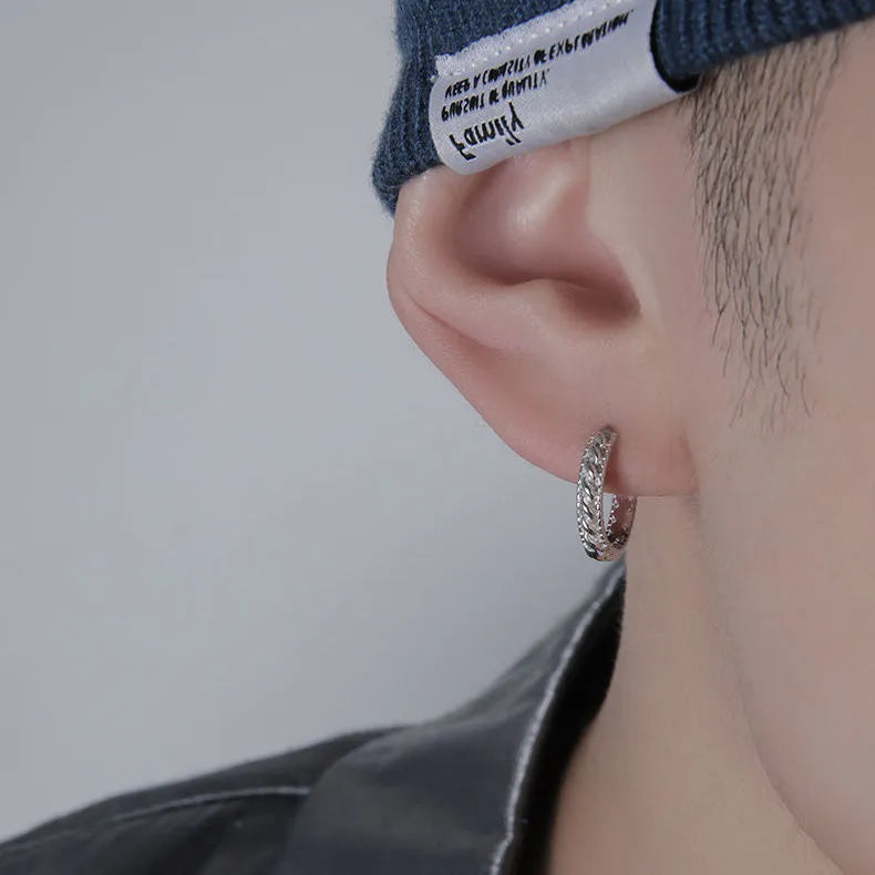 Men's silver geometric hoop earrings in 10mm and 14mm sizes on a plain background.