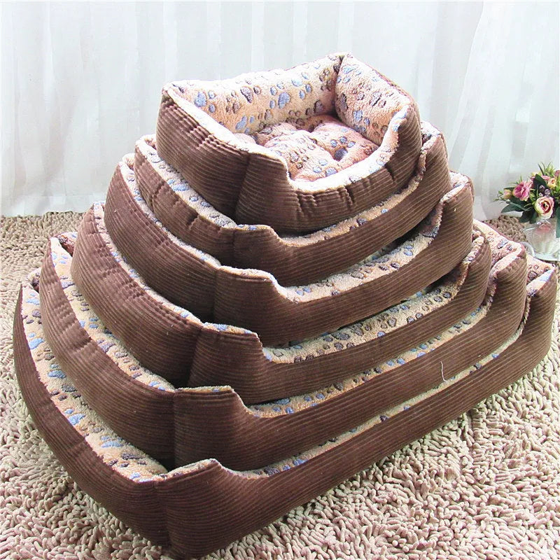Beige plush dog bed with high bolsters and a removable washable cover for small pets.