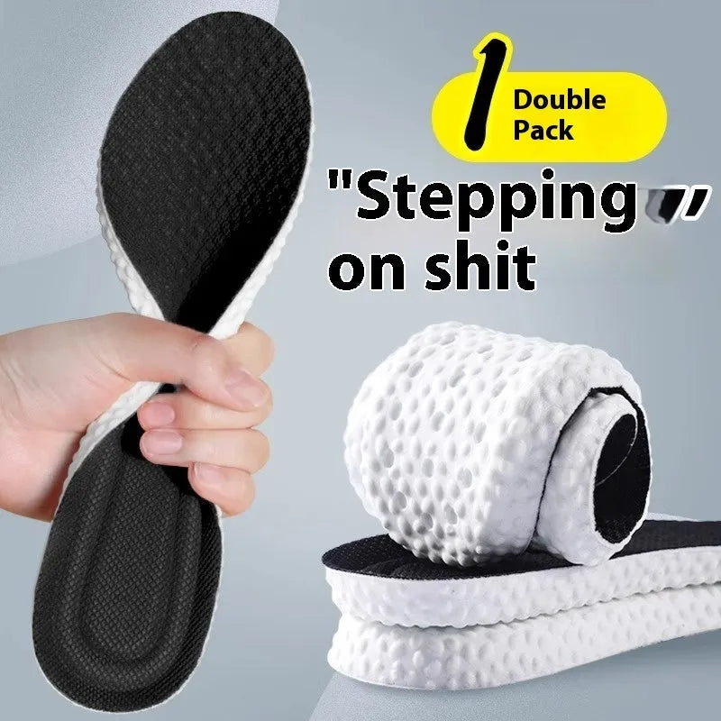 A pair of breathable, soft grey PU sports shoe insoles on a white background, showing their textured surface.