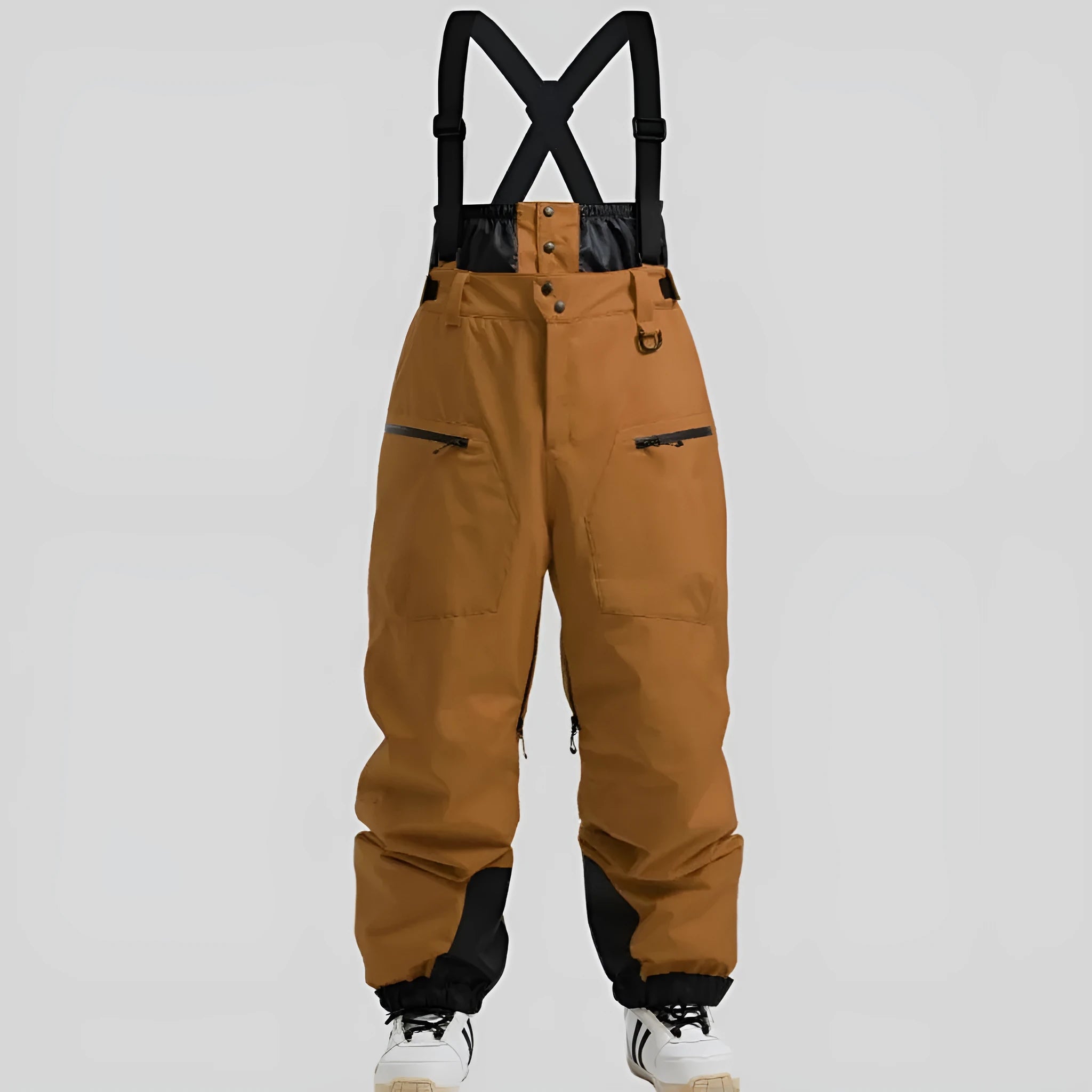 Man wearing black thickened waterproof ski pants with visible adjustable waist straps.