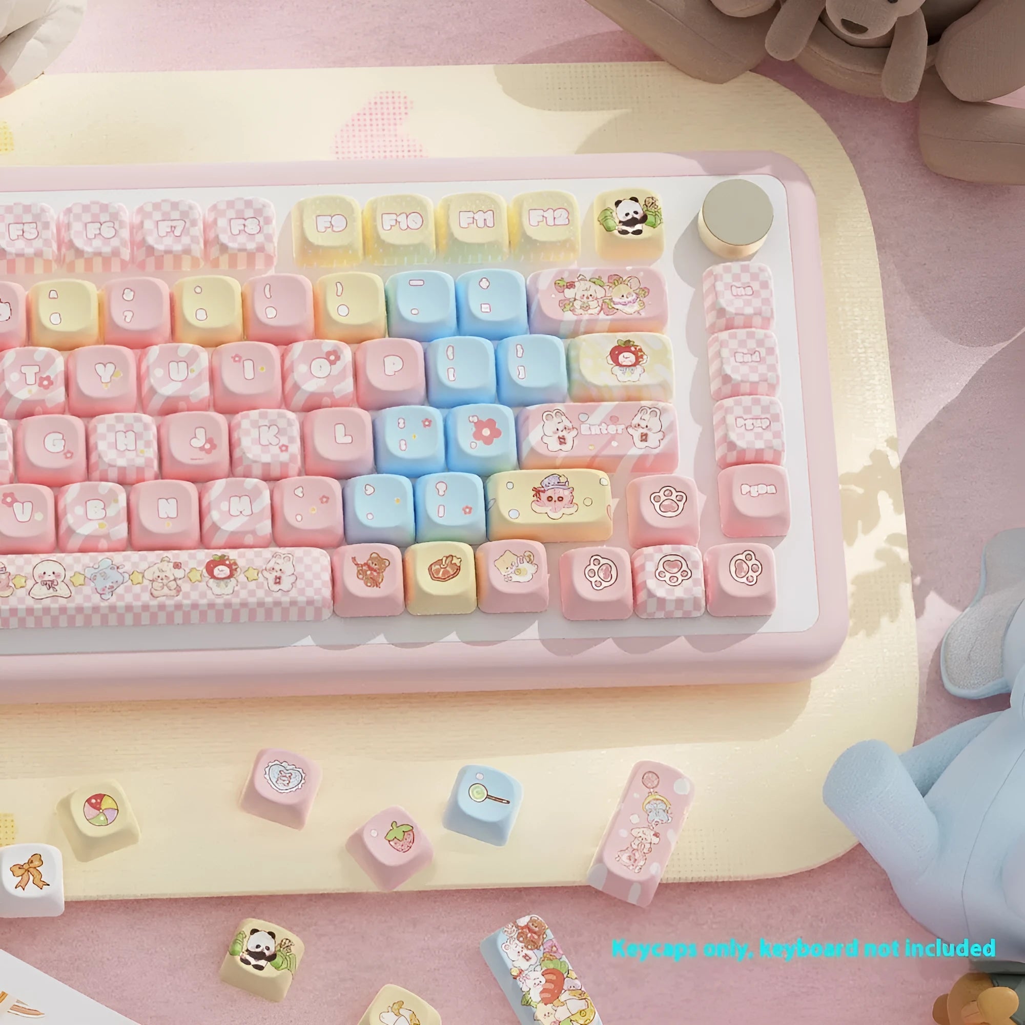 Clip doll themed mechanical keyboard keycaps with colourful doll artwork on key surfaces