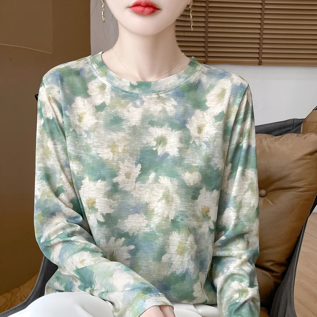Round neck Tencel Cotton pullover shirt with a printed floral design, shown in a basic silhouette with regular sleeves.