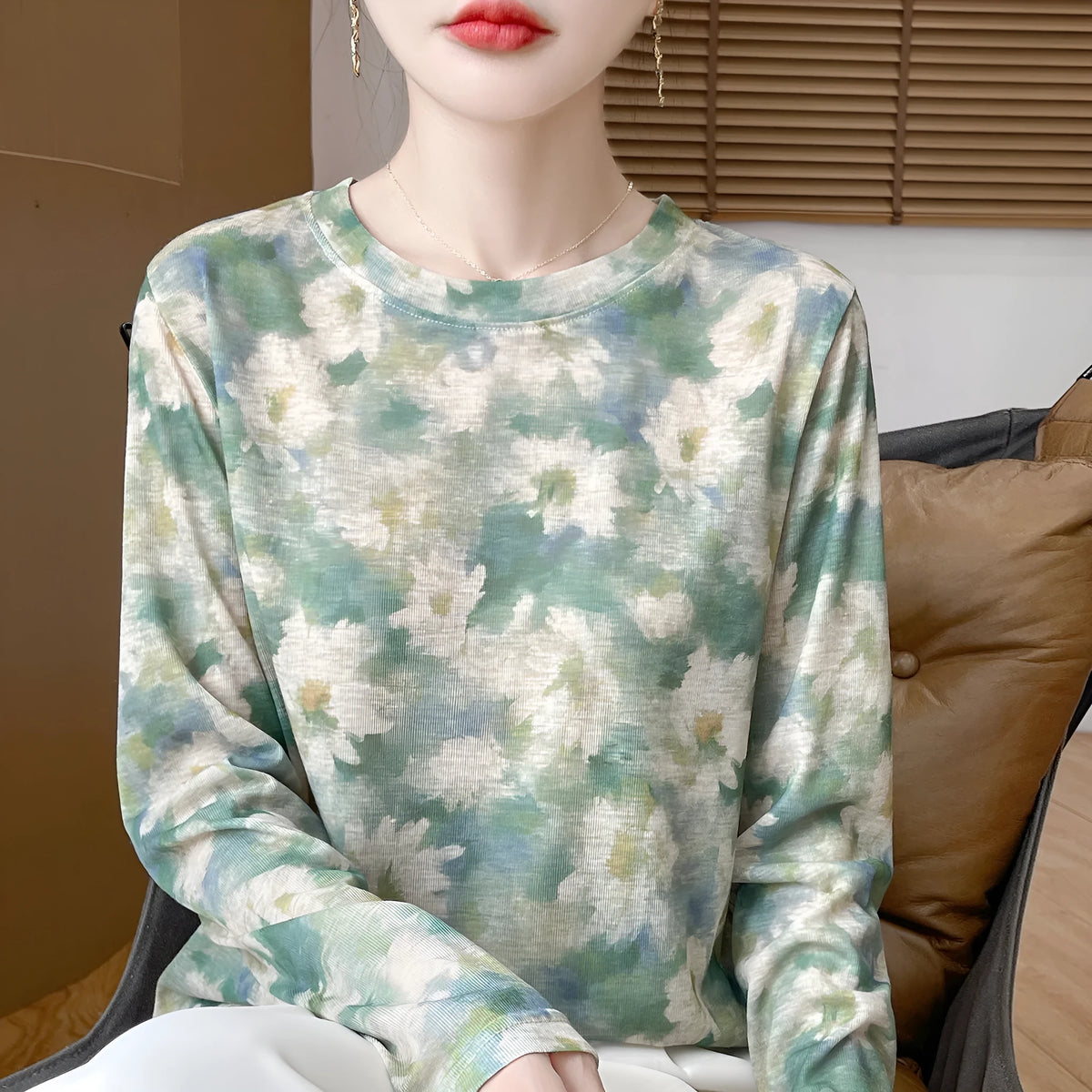 Round neck Tencel Cotton pullover shirt with a printed floral design, shown in a basic silhouette with regular sleeves.