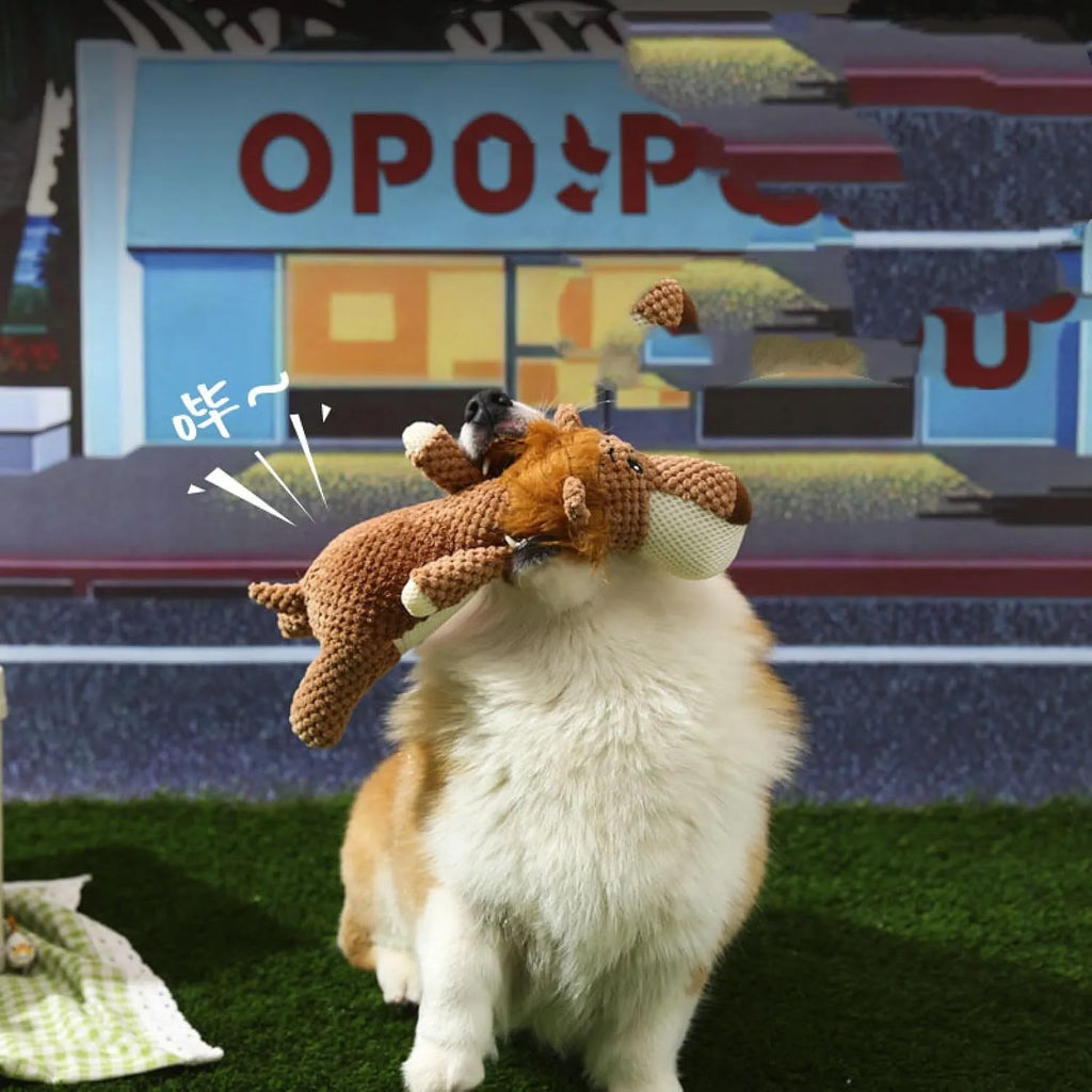 Animal-shaped plush dog toy with corn kernel texture for teeth cleaning and built-in sound device