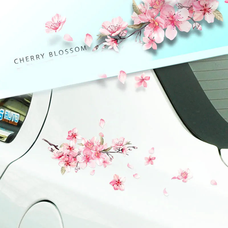 Pink cherry blossom car sticker on vehicle surface showing two size options for customisation
